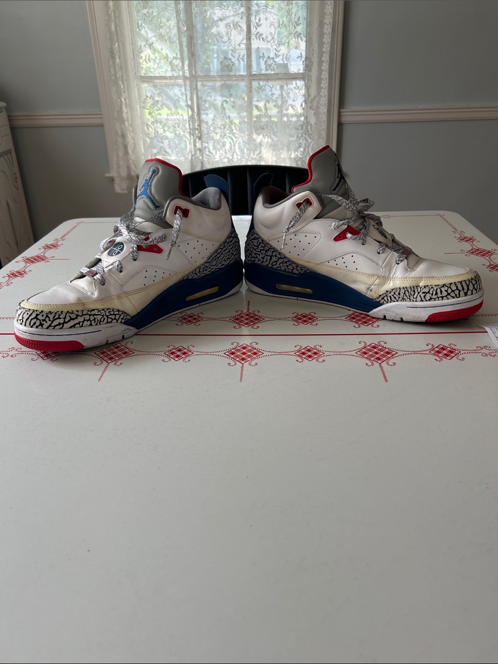 Nike White/Blue/Red Retro Basketball Sneakers with Elephant Print Accents